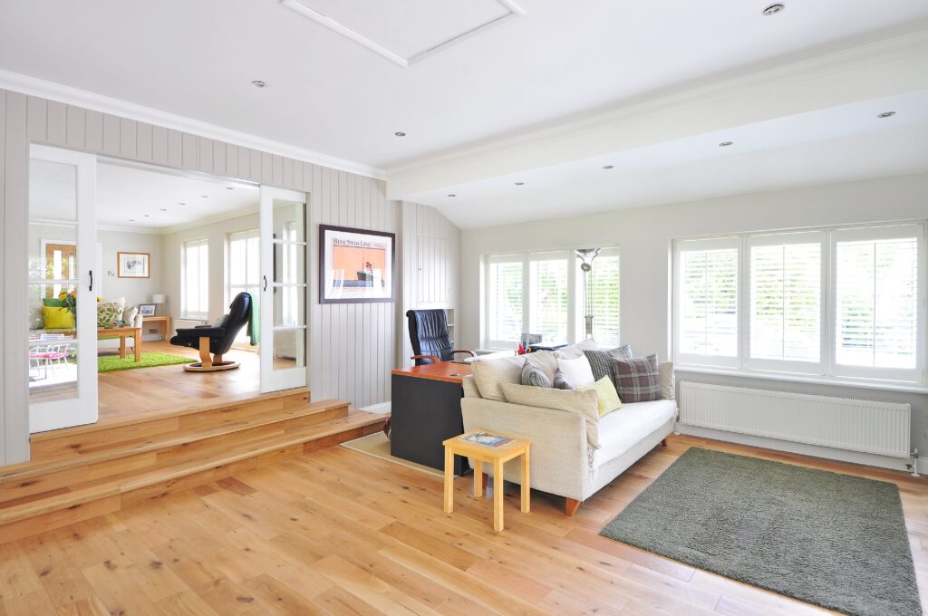 A cozy family room with wooden flooring.