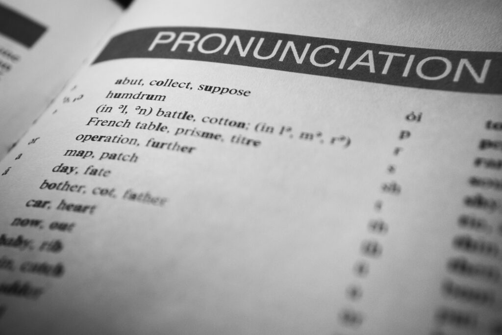 A black and white photo of a book with the word pronunciation, perfect for language learning in the classroom or with kids.