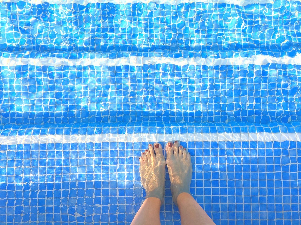 my foot in pool water